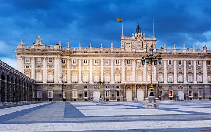 Main facade of Royal Palace in evening time. Madrid, Spain